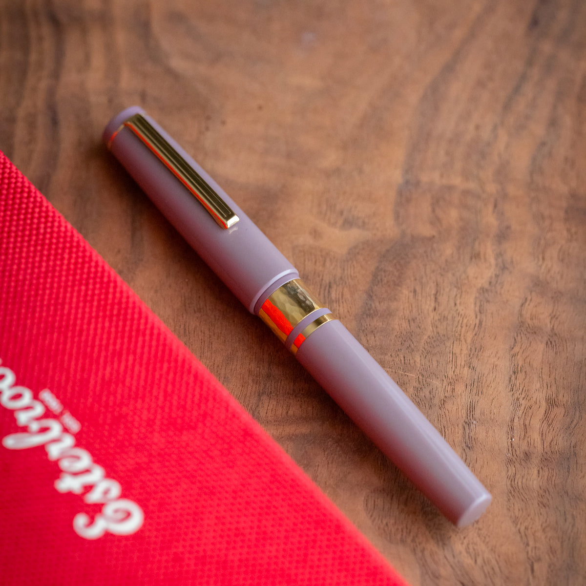Model J Violet Ebonite with Gold trim - Medium